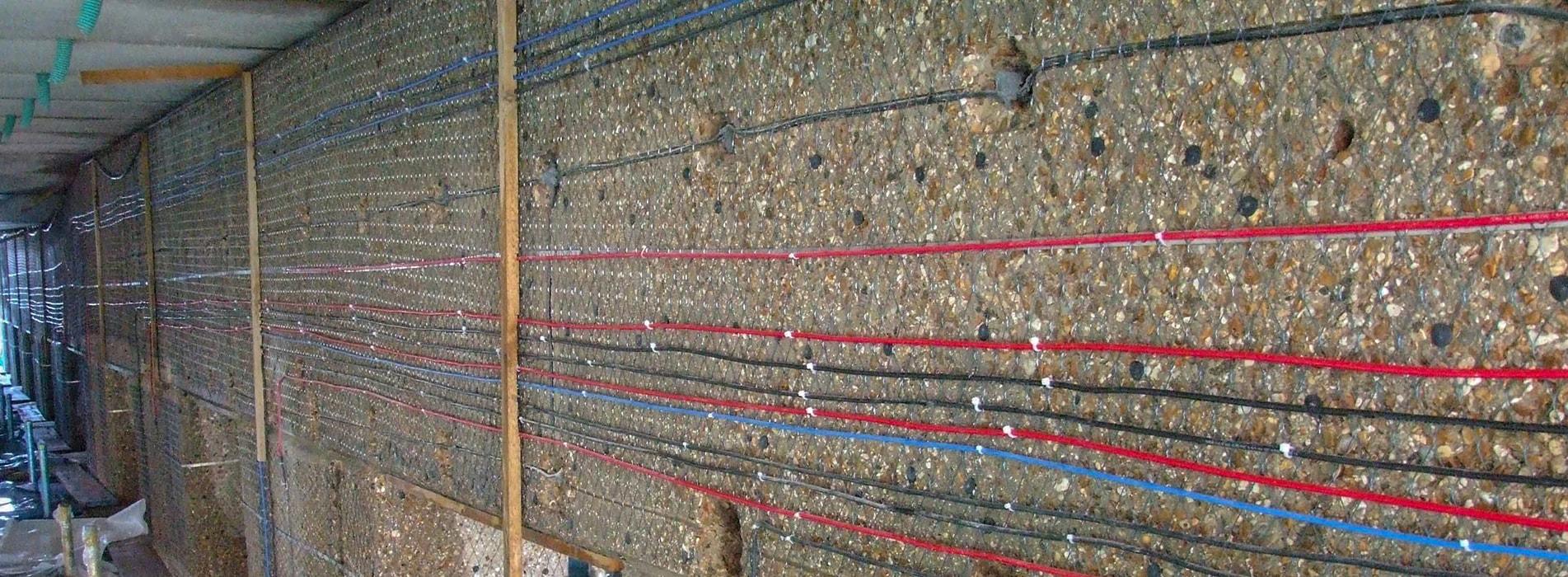 Cathodic protection wiring installed on a reinforced concrete structure